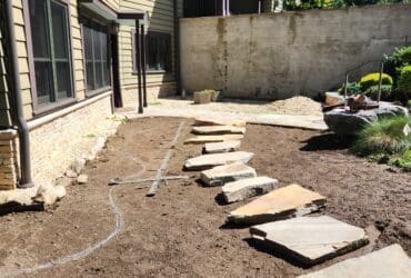 Natural stone path laid out by GJLD masons.